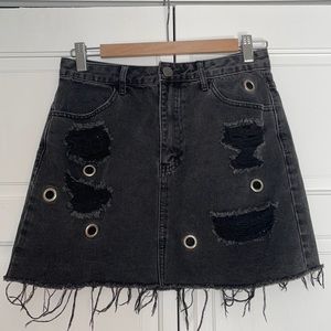 Forever 21 Size 28 Black distressed denim jean skirt. Worn once.